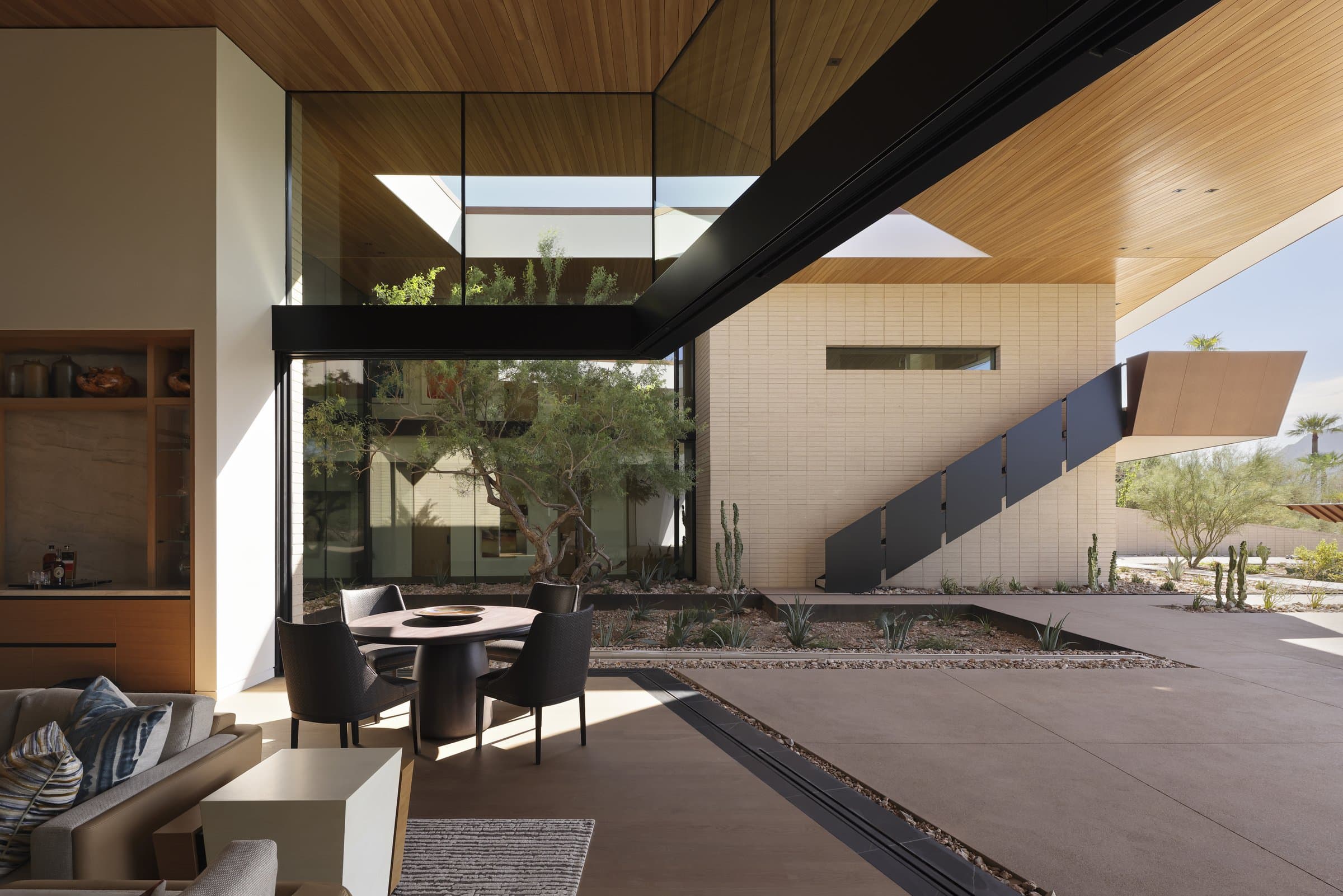 The kitchen and dining area opening to the courtyard