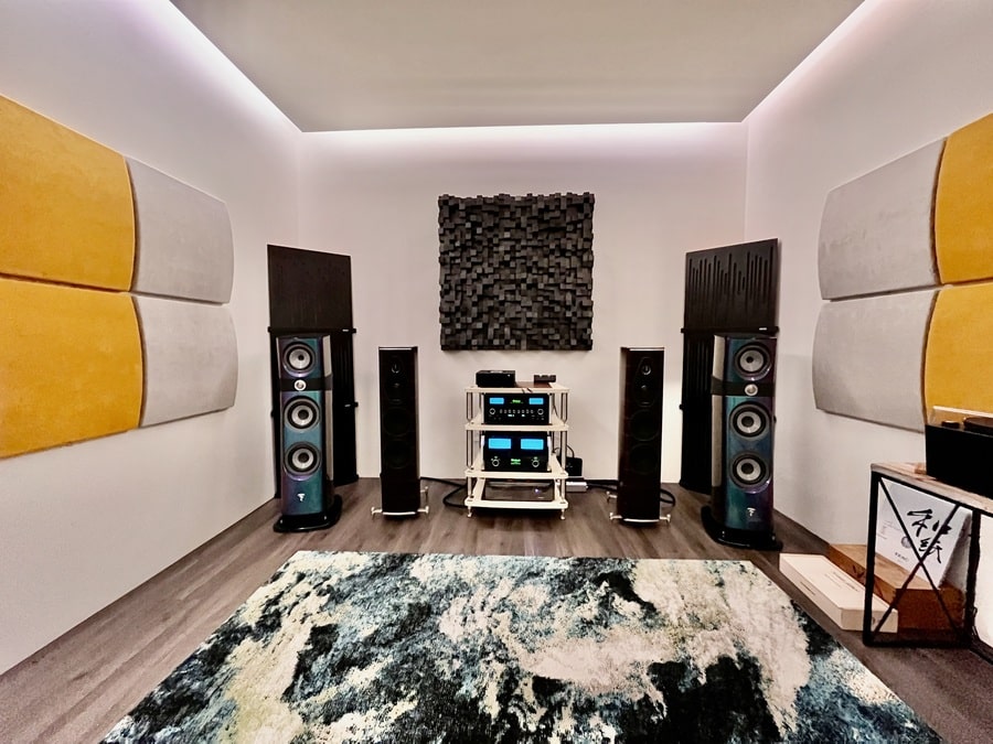 A room with high-end speakers and a top-level amplifier.