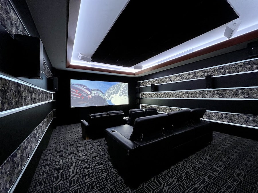 A custom home theater with integrated subwoofers in a Phoenix home.